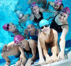 group of experienced swimmers after their private lessons wrapped up